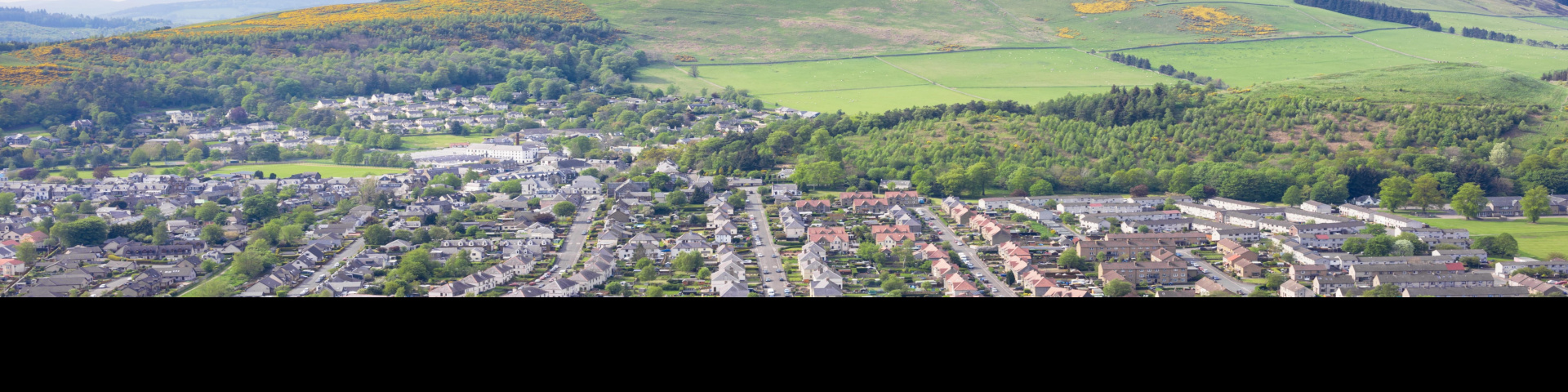 Mixed use landscape showing urban and rural land in Scotland. Credit: iStock.com - georgeclerk.
