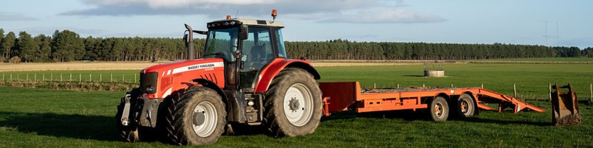 Red tractor on agricultural land in Scotland. Credit: Rural Matters.